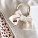 see more listings in the Embroidered Mini Bows section