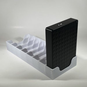 Estuche con soporte para rack para disco duro externo portátil Expansion de Seagate