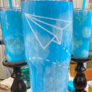 24 oz Reduce Brand Air Plane Tumbler with lid and straw
