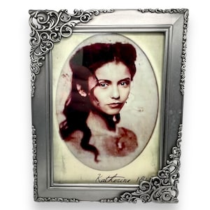 Framed photo of vampire Katherine