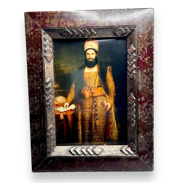 Framed photo of Nandor the Relentless from What We Do in the Shadows