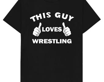 Camiseta que dice "A este chico le encanta la lucha libre"