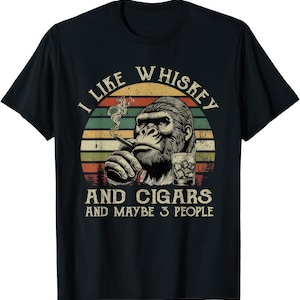 May include: A black t-shirt with a vintage-style graphic of a gorilla smoking a cigar and holding a glass of whiskey. The text reads "I like whiskey and cigars and maybe 3 people."
