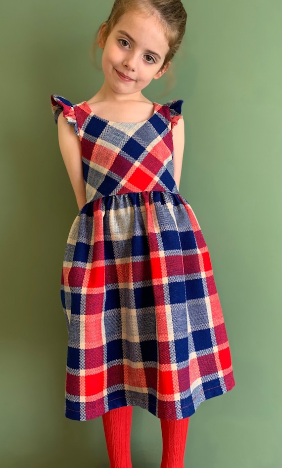 Ladies red top pinafore dress