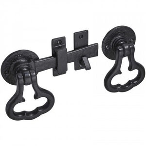 May include: Black metal gate latch with a decorative handle. The latch has a sliding bolt and a hook.