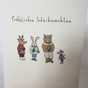 Minimalistische Weihnachtskarte – Frohe Weihnachten auf Aquarellpapier mit Waldtieren