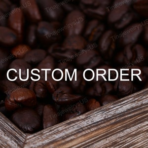 May include: A close-up of a wooden box filled with dark brown coffee beans. The text "CUSTOM ORDER" is printed in white on the box.