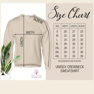 May include: Beige unisex crewneck sweatshirt with size chart showing measurements in inches for sizes S through 4XL. The chart shows width, length, and sleeve length.
