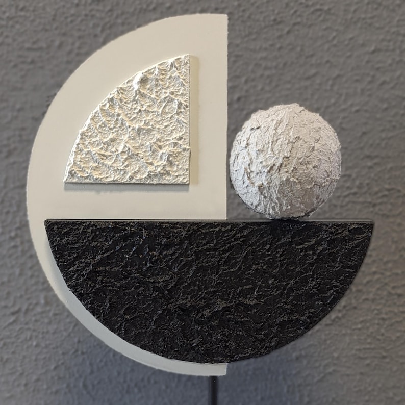 Geometric resin art piece with textured finish