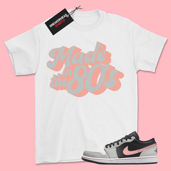 grey and pink jordan shirt