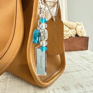 coach hang tag bag charms