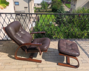 Sillón y reposapiés vintage de cuero escandinavo de Arnt Lande para Westnofa, Noruega