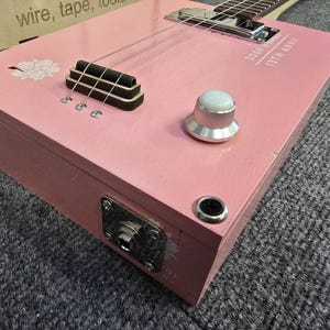 Room 101 Pink 3 String Cigar Box Guitar