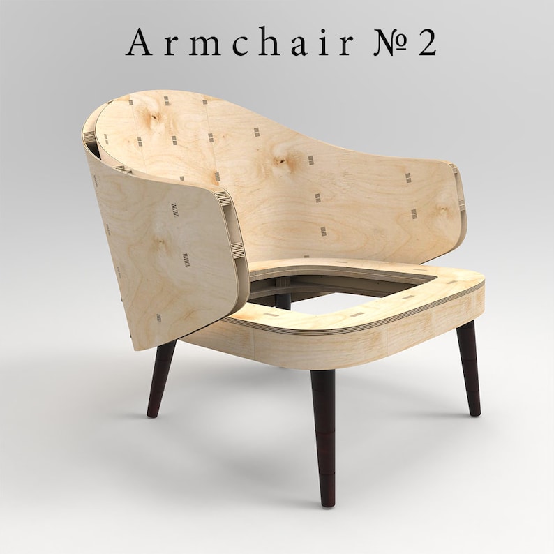 Op de afbeelding: Een houten fauteuil met een frame van multiplex en donkerbruine poten. De stoel is gedemonteerd, met de rugleuning en de zitting gescheiden. De stoel is gelabeld "Armchair No. 2".