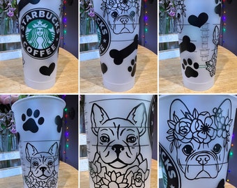 May include: Six clear plastic cups with black and white designs. The designs include a paw print, a bone, a heart, a French bulldog, and the Starbucks logo. The cups are all the same size and shape.
