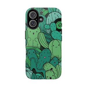 Peut inclure: Une coque de t&eacute;l&eacute;phone verte avec un design fantaisiste repr&eacute;sentant des cactus et des succulentes en dessin anim&eacute;. La coque a une bordure noire et une d&eacute;coupe pour l'objectif de l'appareil photo.