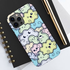 May include: A white iPhone case with a colorful cartoon design of clouds with faces. The clouds are in shades of blue, green, yellow, and pink.