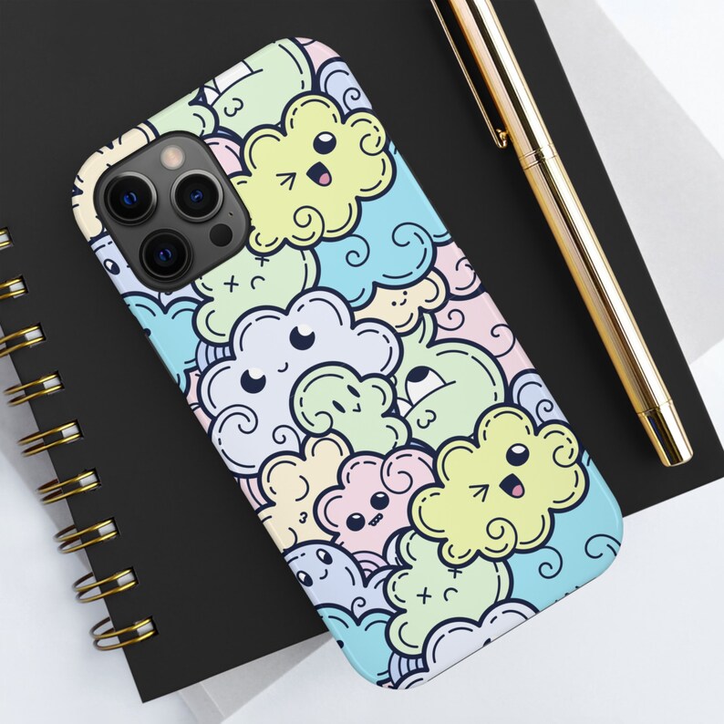 May include: A white iPhone case with a colorful cartoon design of clouds with faces. The clouds are in shades of blue, green, yellow, and pink.