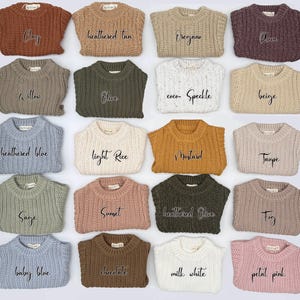 May include: A collection of twenty chunky knit jumpers arranged in a grid, each labelled with colour names including clay, heathered tan, oregano, plum, willow, olive, coco-speckle, beige, heathered blue, light rice, mustard, taupe, sage, sunset, heathered olive, fog, baby blue, chocolate, milk white, and petal pink.