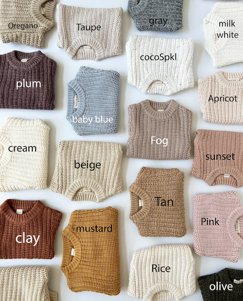 May include: A collection of folded knit sweaters in various colors labeled with text including Oregano, Taupe, gray, milk white, plum, cocoSpkl, baby blue, Apricot, cream, beige, Fog, sunset, clay, mustard, Tan, Pink, Rice, and olive.