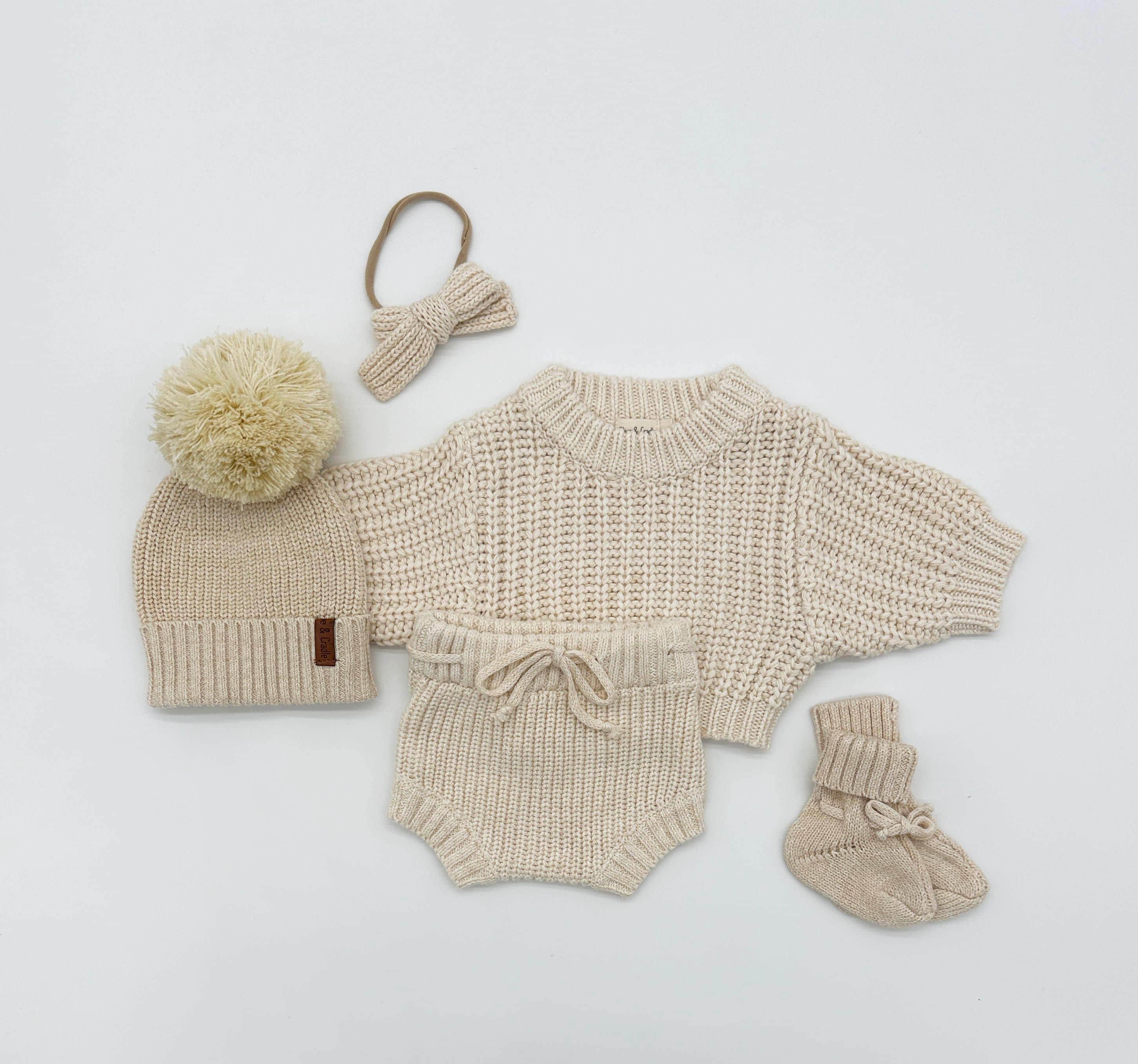 Baby knit sweater with hat and booties set