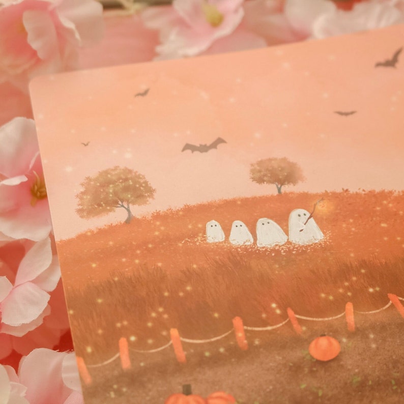 May include: A digital illustration of a whimsical Halloween scene with five white ghosts in a field of orange grass. The ghosts are lined up in a row, with the last one holding a stick with a glowing orange light at the end. There are two trees in the background, and a fence in the foreground.