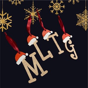May include: Four wooden Christmas decorations shaped like the letters M, L, T, and G. Each letter has a red and white Santa hat on top. The decorations are hanging from red ribbon.