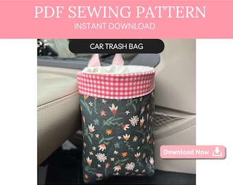 May include: PDF sewing pattern for a car trash bag. The bag is made of black fabric with a floral print and has a pink and white gingham trim. The bag is hanging on the side of a car seat. Download Now.