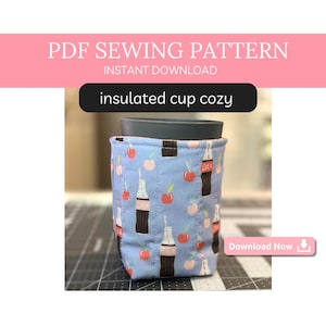 May include: A light blue insulated cup cosy with a pattern of cherries and soda bottles. The text "insulated cup cosy" is displayed on the image. The image also includes the text "PDF Sewing Pattern" and "Instant Download".