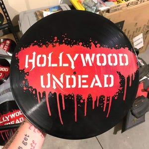 May include: A set of three ceramic mugs with a speckled, matte finish. The mugs are in shades of cream, light gray, and dark gray. Each mug has a simple, minimalist design, perfect for coffee or tea.