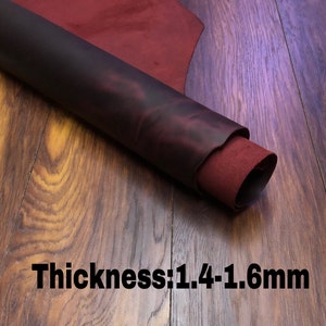 May include: A roll of dark brown leather with a burgundy suede lining. The leather is 1.4-1.6 mm thick.