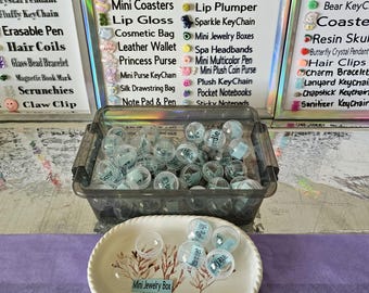 Bolas sorpresa misteriosas / Neceser / Pulseras / Monederos / Joyeros / Mini posavasos / Brillo labial / Loción corporal / Carteras y más