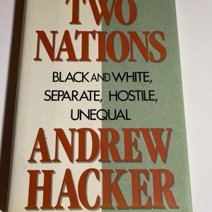 May include: A book titled "Two Nations: Black and White, Separate, Hostile, Unequal" by Andrew Hacker. The book cover is white and green with red text.