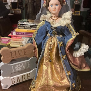 Vintage Victorian royalty dress blue gold 16” porcelain doll with cloth body decorated in beads jewels collectible doll