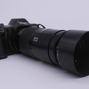 Minolta Dynax 8000i Camera with AF Zoom 70-210mm Lens (Damaged)