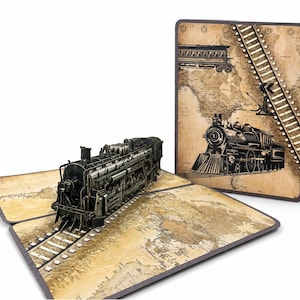 May include: A detailed, black metal model of a steam train on a track, emerging from a vintage-style card. The card features a sepia-toned world map and illustrations of trains and train tracks. The overall design evokes a sense of nostalgia and travel.