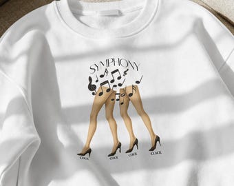 Sudadera Click Clack Symphony, ilustración musical retro estilo pin-up.