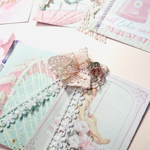 May include: A scrapbook page with a pink and white lace trim, a pink and white floral design, and the text "Sweet like candy 125139157167".