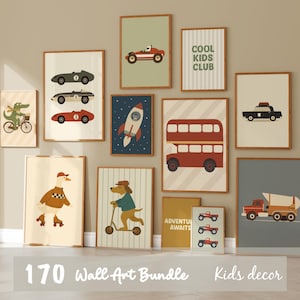 May include: A set of framed wall art prints with illustrations of vehicles, animals, and text. The prints include a race car, rocket ship, double-decker bus, and a police car. The text on the prints reads "Cool Kids Club" and "Adventure Awaits".