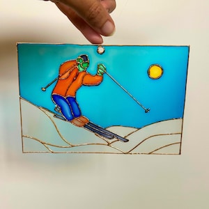 Skier Suncatcher, Skiing Glass Art, Skiing Decor, Skiing Glass Painting, Mountain Chalet piece, ski resort collectible, skiing art for Home