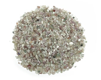 May include: A close-up of a pile of small, colorful, and translucent stones. The stones are mostly white with hints of pink, green, and brown.
