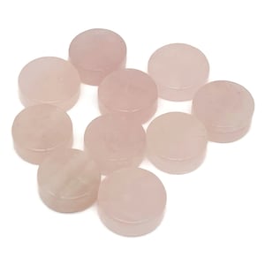 May include: Ten round, pale pink, rose quartz stones. The stones are smooth and polished.