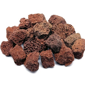 Può includere: Un mucchio di rocce laviche rosse e marroni, ideali per l'uso in terrari, acquari o come accenti decorativi.