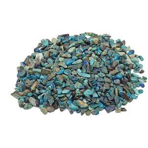 May include: A pile of small, teal and blue, irregularly shaped, tumbled stones.