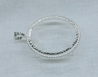 Srebrna ramka na monetę: oprawa z skręconej liny, produkcja biżuterii