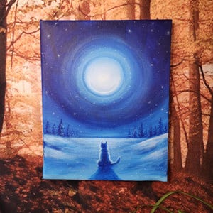 May include: A painting depicting a blue wolf seated in a snowy landscape beneath a full moon. The sky is a dark blue with white stars and the moon is a bright white.