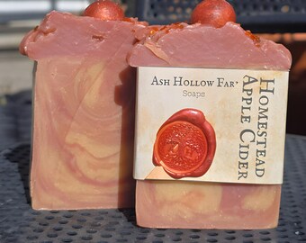 Homestead Apple Cider Soap:Fragrant notes of spiced apple cider,  goji berry, ginger root, and cassia root, with delicate green field notes.