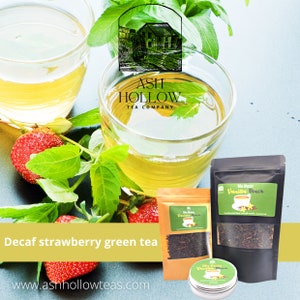 May include: Decaf strawberry green tea from Ash Hollow Tea Company. The image shows a glass of green tea, a bag of No Buzz Vanilla Black tea, and a tin of No Buzz Vanilla Black tea.