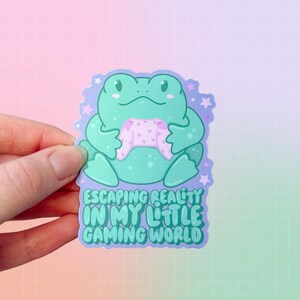 Escaping Reality In My Little Gaming World Sticker | Frogs | Cozy Gaming | Video games | PC Game | Controller | Gamer Girl | Mental Health