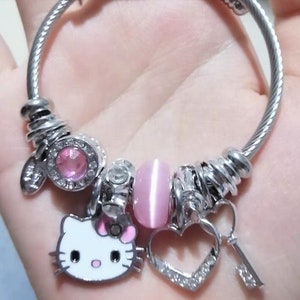 Hello Kitty Sanrio Charm Hearts Bracelet - Officially Licensed, 6.5 + 1'' Chain - Silver Tone, Pink